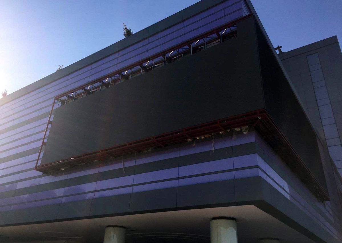 Outdoor LED display mounted on a steel structure on the facade of Vega Mall