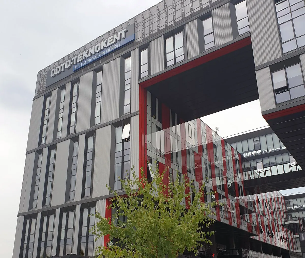 A modern glass-fronted technopark building